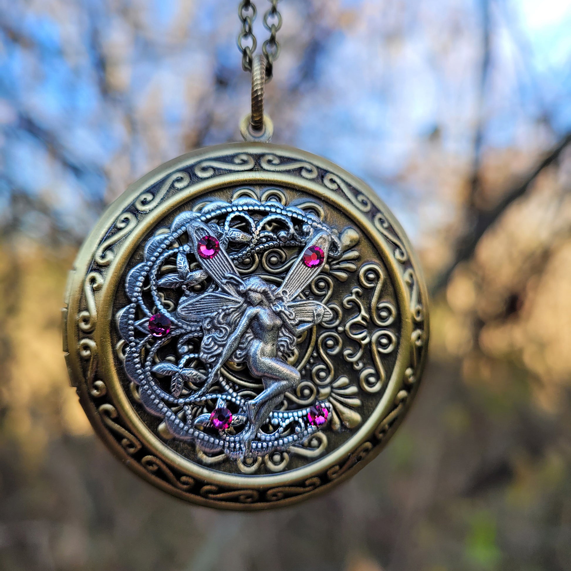 Beautiful large fairy locket necklace for those who love fantasy jewelry.