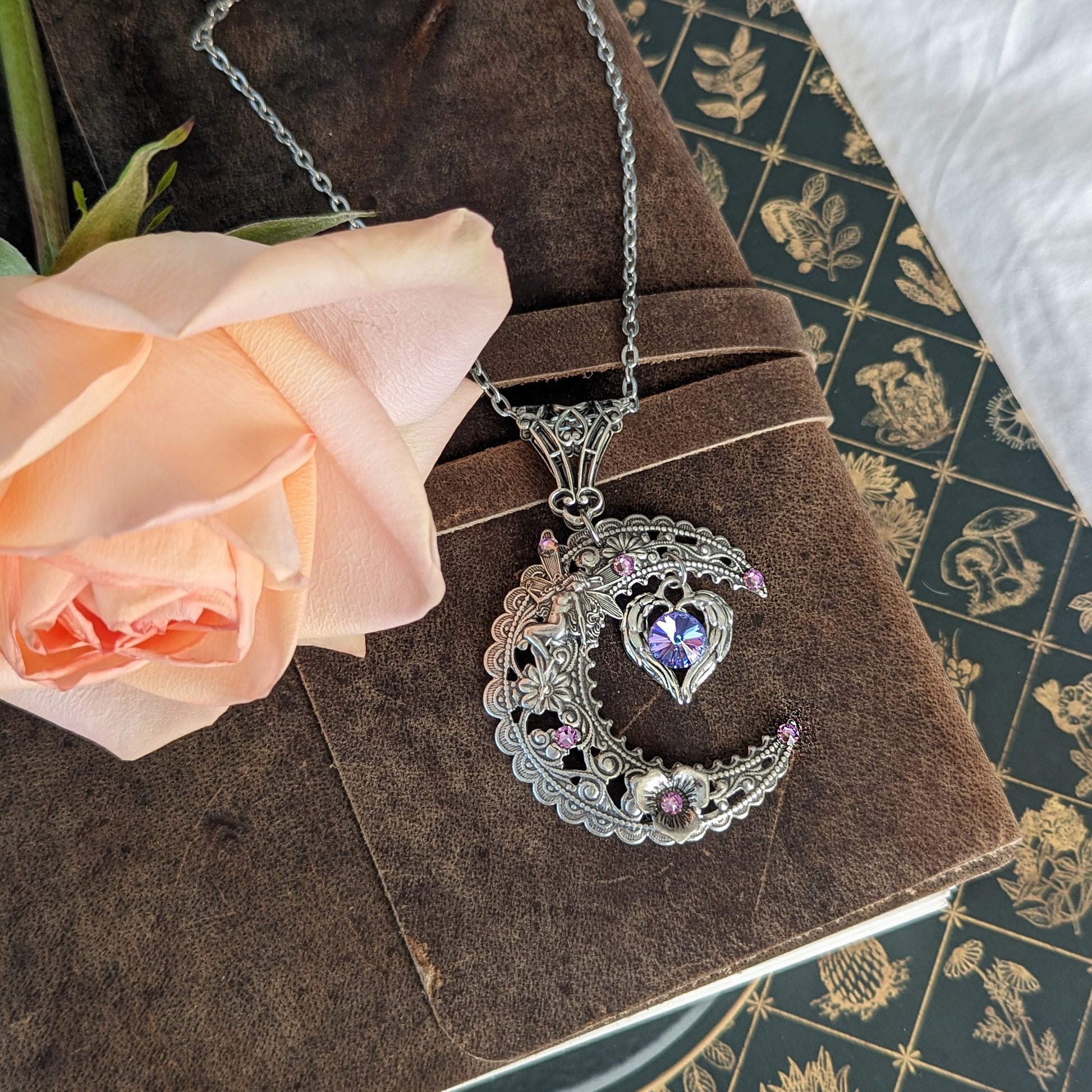 Magical Sterling Silver Vintage Fairy on Crescent Moon necklace with a heart and Swarovski crystals. Fantasy jewelry.