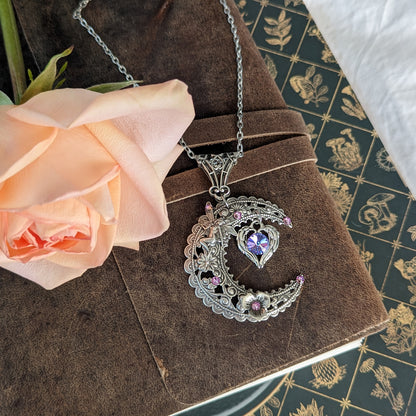 Magical Sterling Silver Vintage Fairy on Crescent Moon necklace with a heart and Swarovski crystals. Fantasy jewelry.