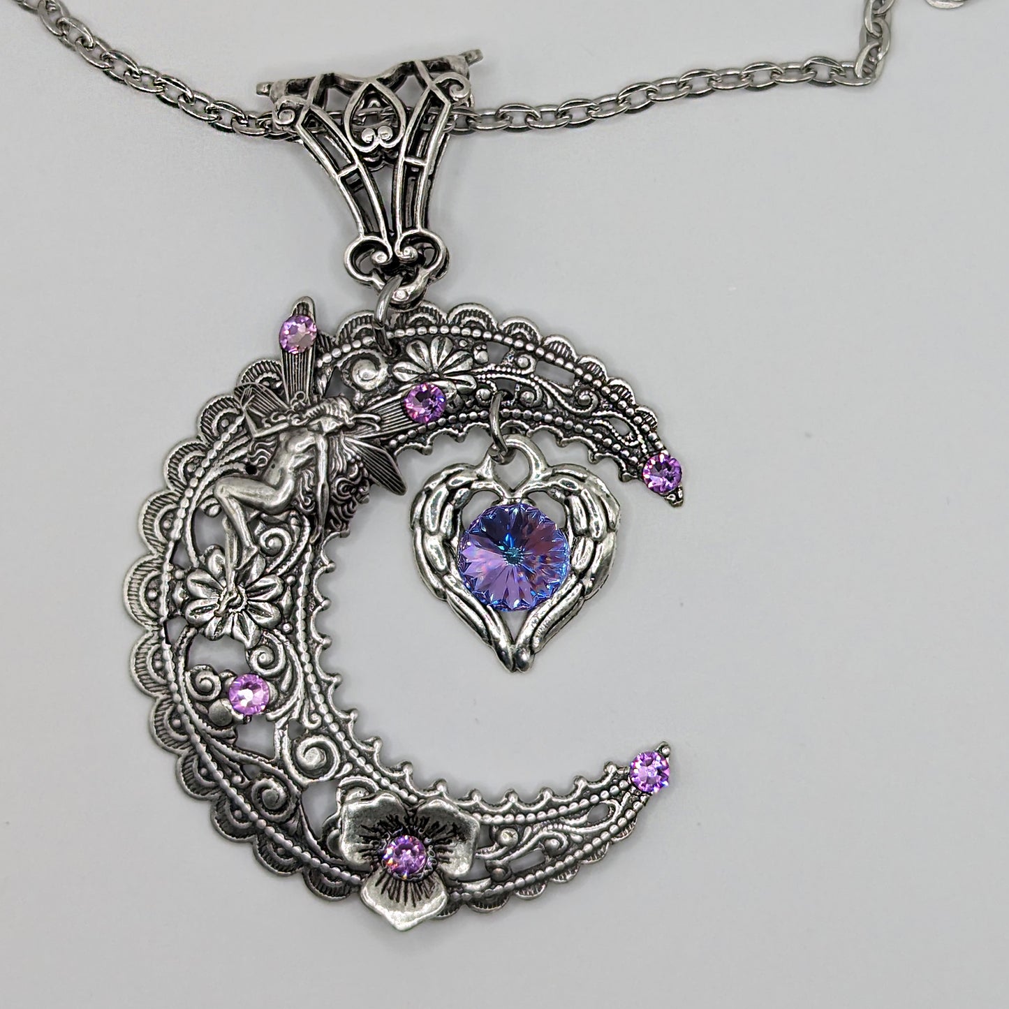 Magical  Sterling Silver Vintage Fairy on Crescent Moon necklace with  a heart and Swarovski crystals.  Fantasy jewelry lover gift.