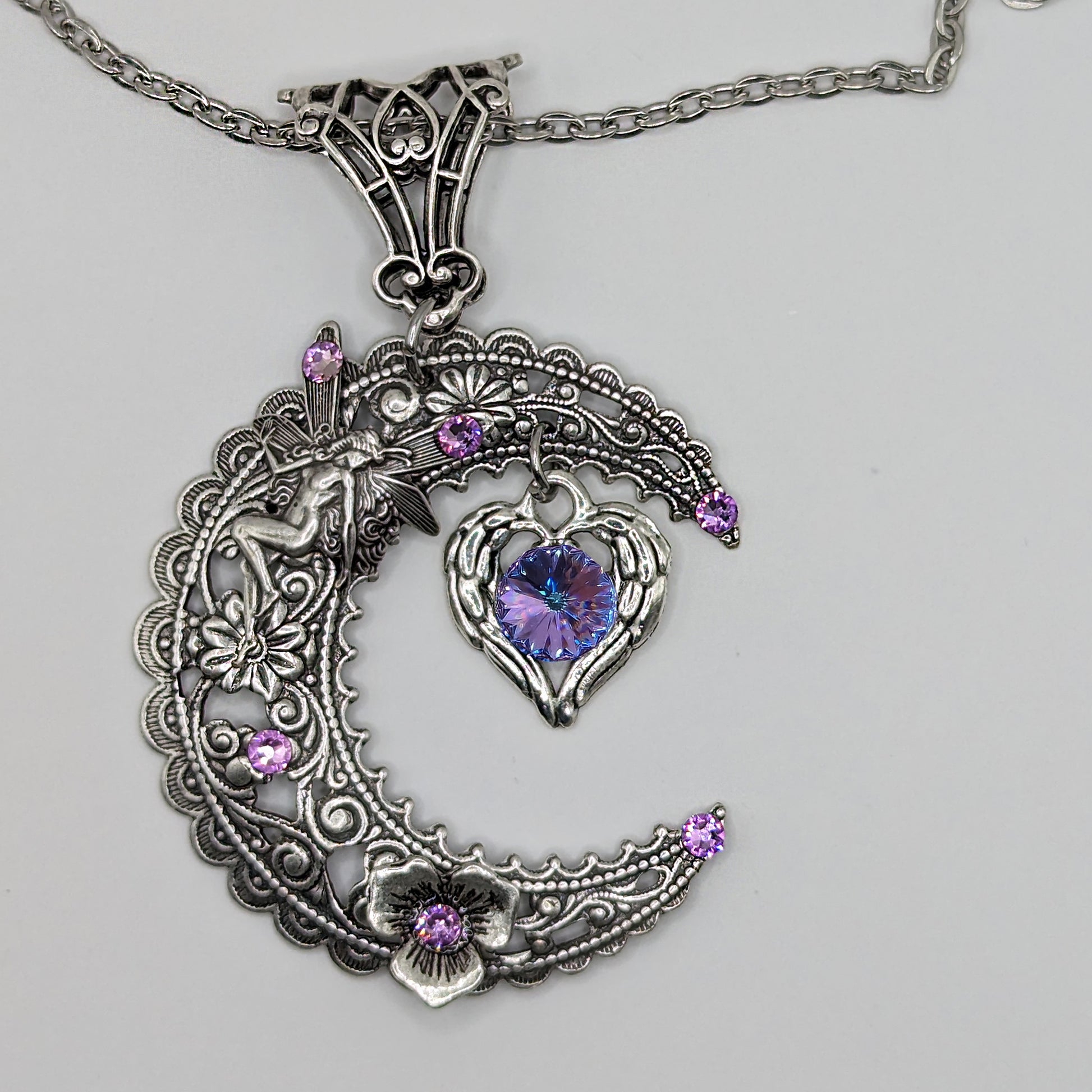 Magical  Sterling Silver Vintage Fairy on Crescent Moon necklace with  a heart and Swarovski crystals.  Fantasy jewelry lover gift.