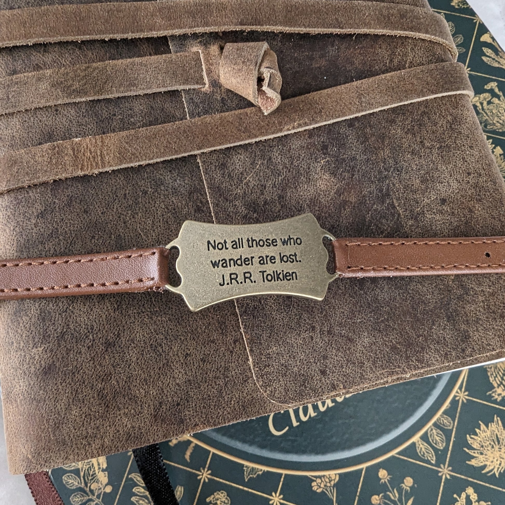 Lord of the Rings themed bracelet with J.R.R. Tolkien quote: Not all those who wander are lost