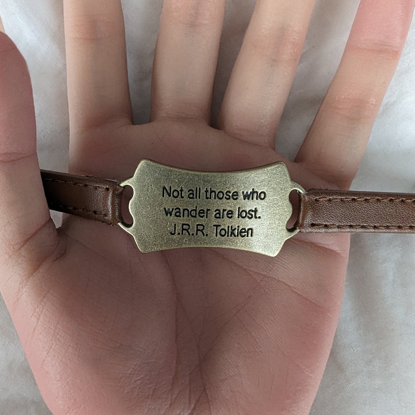 Lord of the Rings themed bracelet with J.R.R. Tolkien quote: Not all those who wander are lost