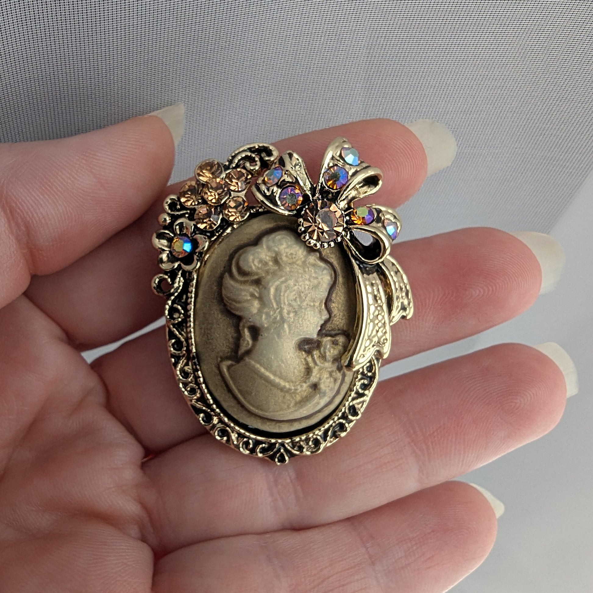 Vintage Classic Lady Cameo Brooch in Soft Ivory Necklace with Floral and Bow Accents