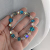 Radiant Aquamarine Blue Crystal Stretch Bracelet with Gold Accents