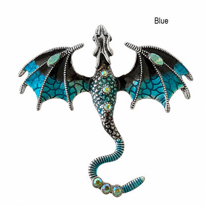 Blue dragon-shaped brooch pendant with silver accents on a white background.  Dragon fantasy jewelry