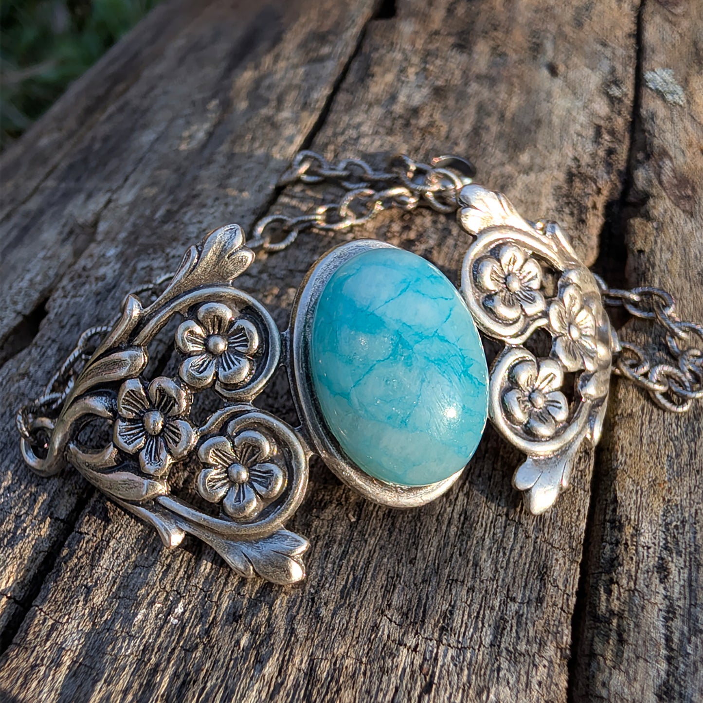 Silver bracelet withBlue Amazonite Ocean stone on a wooden surface,  Beach jewelry.  Boho Bracelet