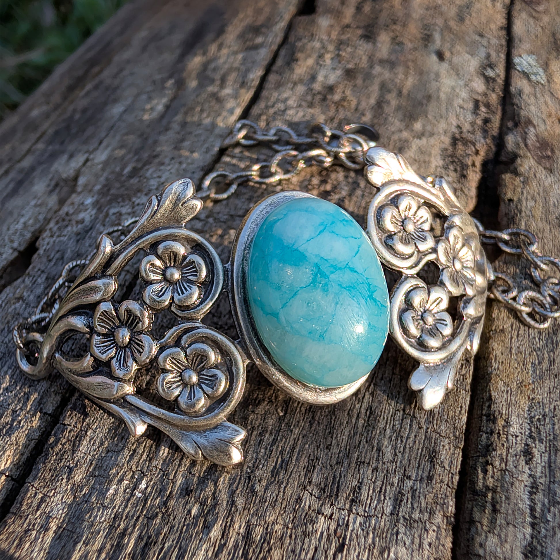 Silver bracelet withBlue Amazonite Ocean stone on a wooden surface,  Beach jewelry.  Boho Bracelet