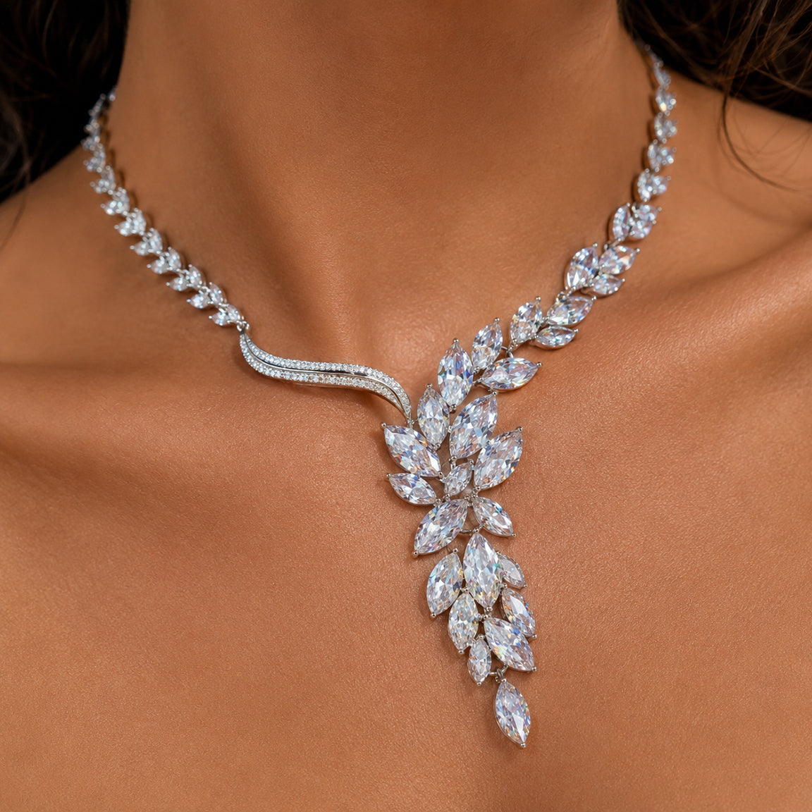 Elegant bridal cubic zirconia diamond necklace with leaf detail on a model's neck