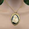 Virgin Mother Mary Kissing the Head of Baby Jesus Cameo brooch pendant being worn with a chain around a neck