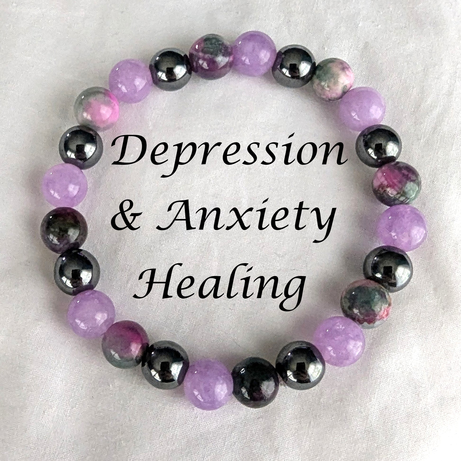 Bracelet with violet purple, Persian Jade and black hematite beads on white background