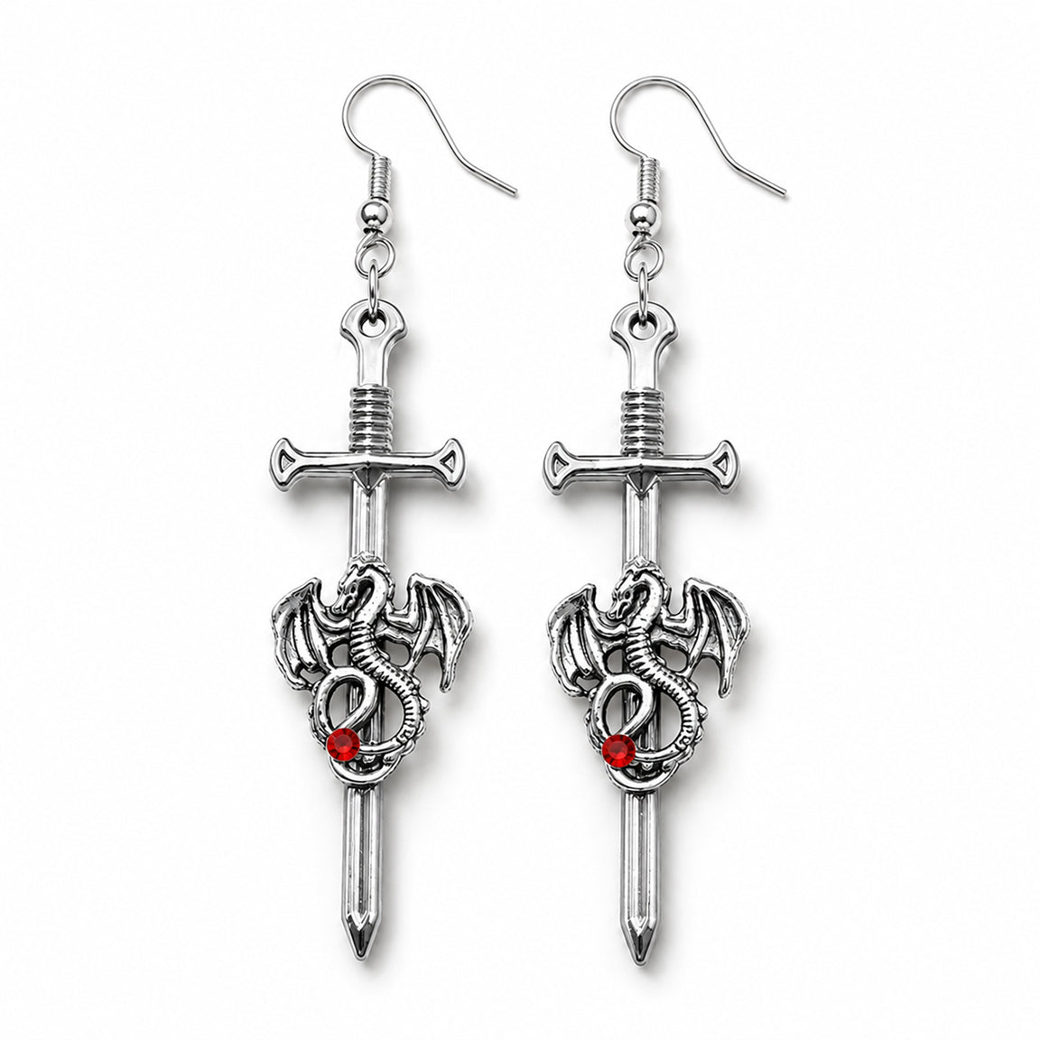 Silver sword-shaped earrings with dragon designs and red gemstones on a white background