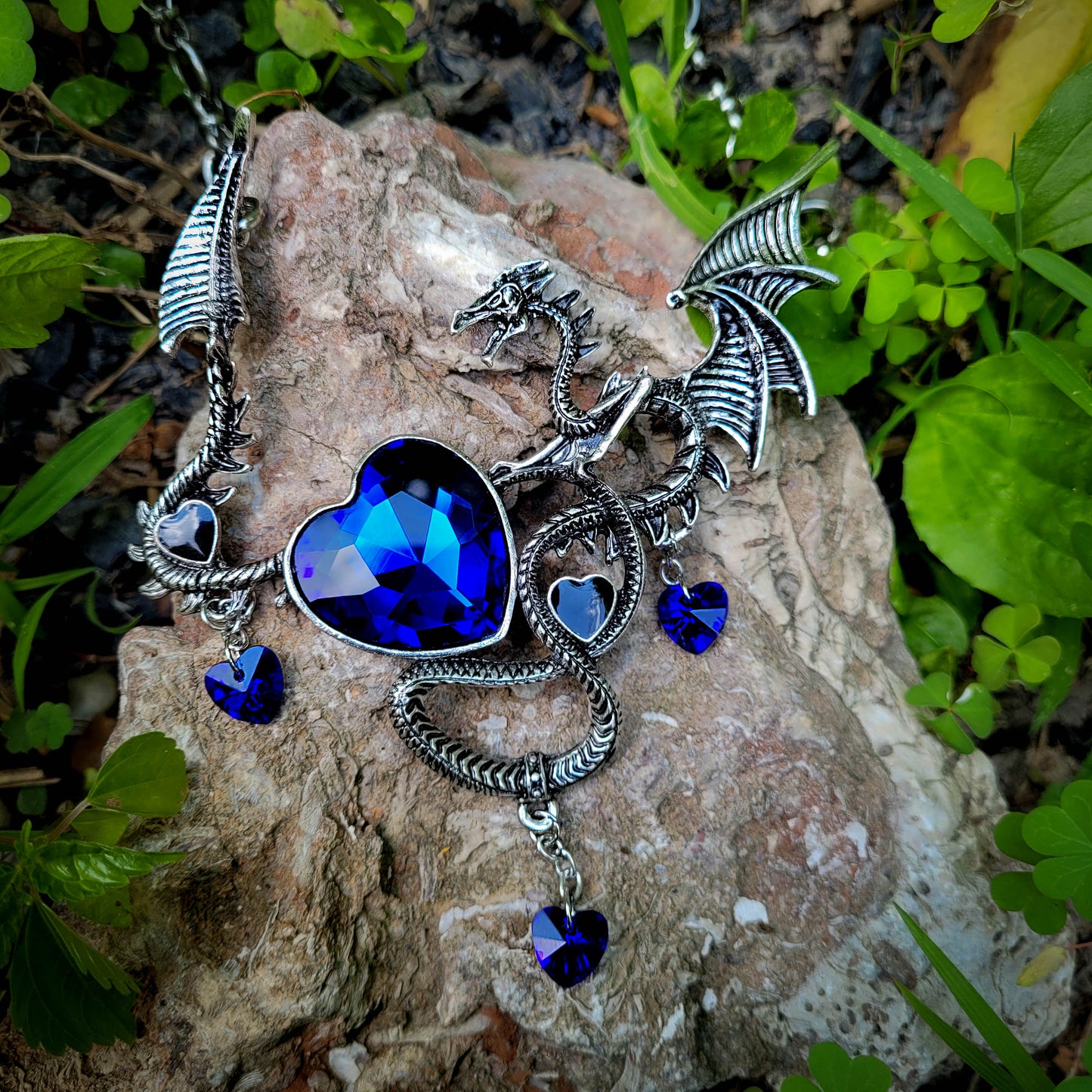 Blue dragon choker necklace-fantasy jewelry, on a stone outside