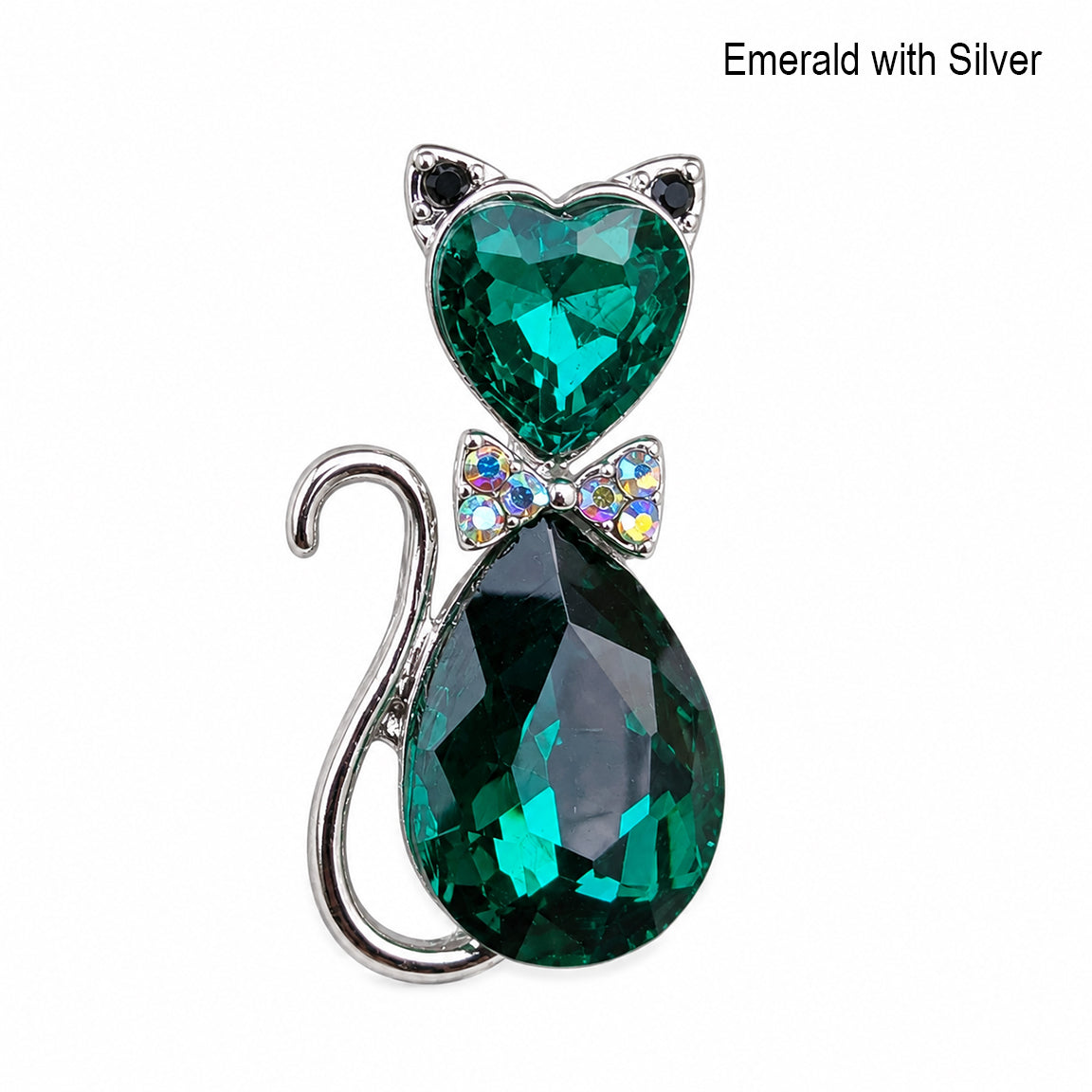 crystal pendant with emerald green gemstones and silver accents on a white background