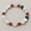 holiday style bracelet made from rose quartz, green jade, white howlite and Swarovski crystal beads.