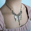 Whimsical vintage fairy Butterfly jewelry on a model with a light pink top