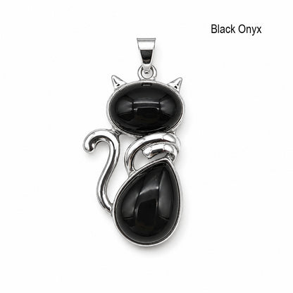 Black onyx cat pendant with silver detailing on a white background