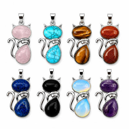 Set of cat-shaped pendants with various colored gemstones on a white background.  Cat lover jewelry