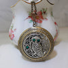 Owl on moon locket necklace with emerald Swarovski rhinestones.  Owl jewelry.