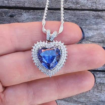 Sterling Silver Tanzanite Heart Necklace with Cubic Zirconia Stones.