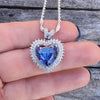 Sterling Silver Tanzanite Heart Necklace with Cubic Zirconia Stones.