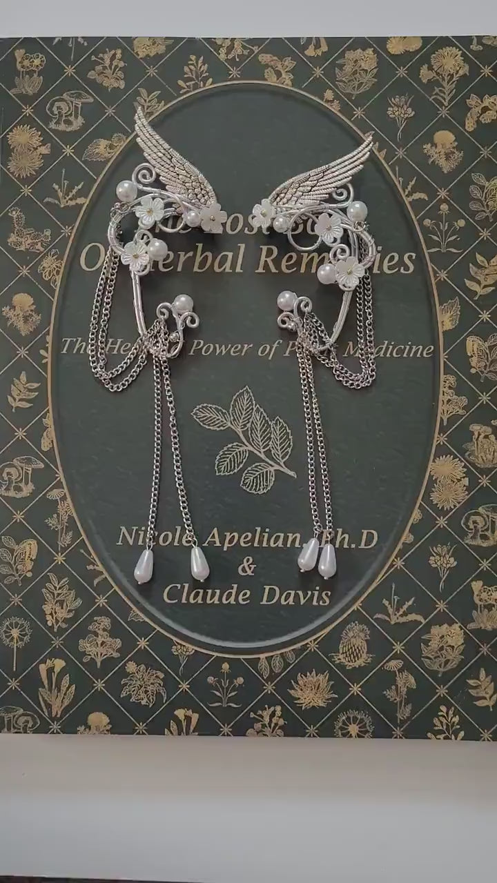 Elf fantasy ear cuffs with flowers and shoulder-length chains.  Elven jewelry.