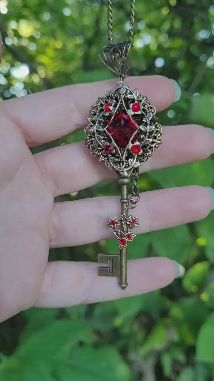 Vintage Elven floral bronze fantasy key necklace made with Scarlet Swarovski crystals.  Fantasy jewelry.  Magical Jewelry