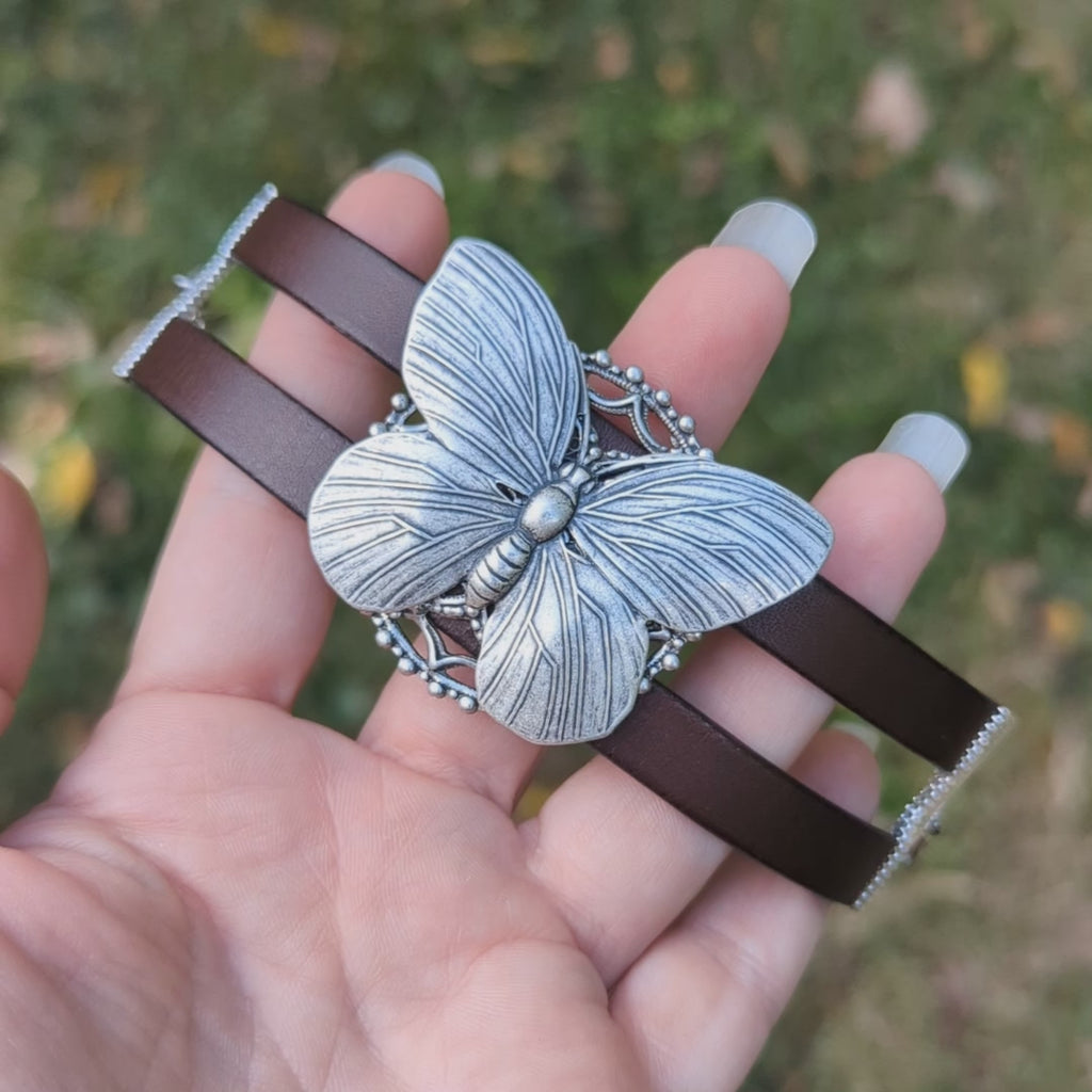 silver Butterfly bracelet on a brown leather strap