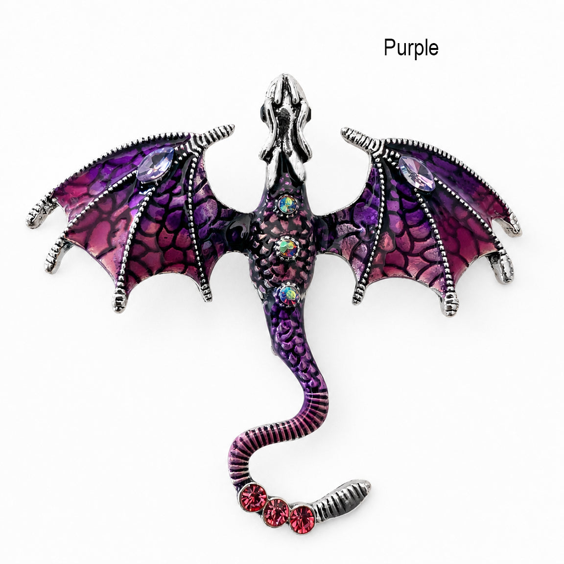 Purple dragon-shaped brooch pendant with gemstones on a white background.  Dragon fantasy jewelry