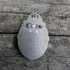 back side of cameo pendant displaying brooch pin