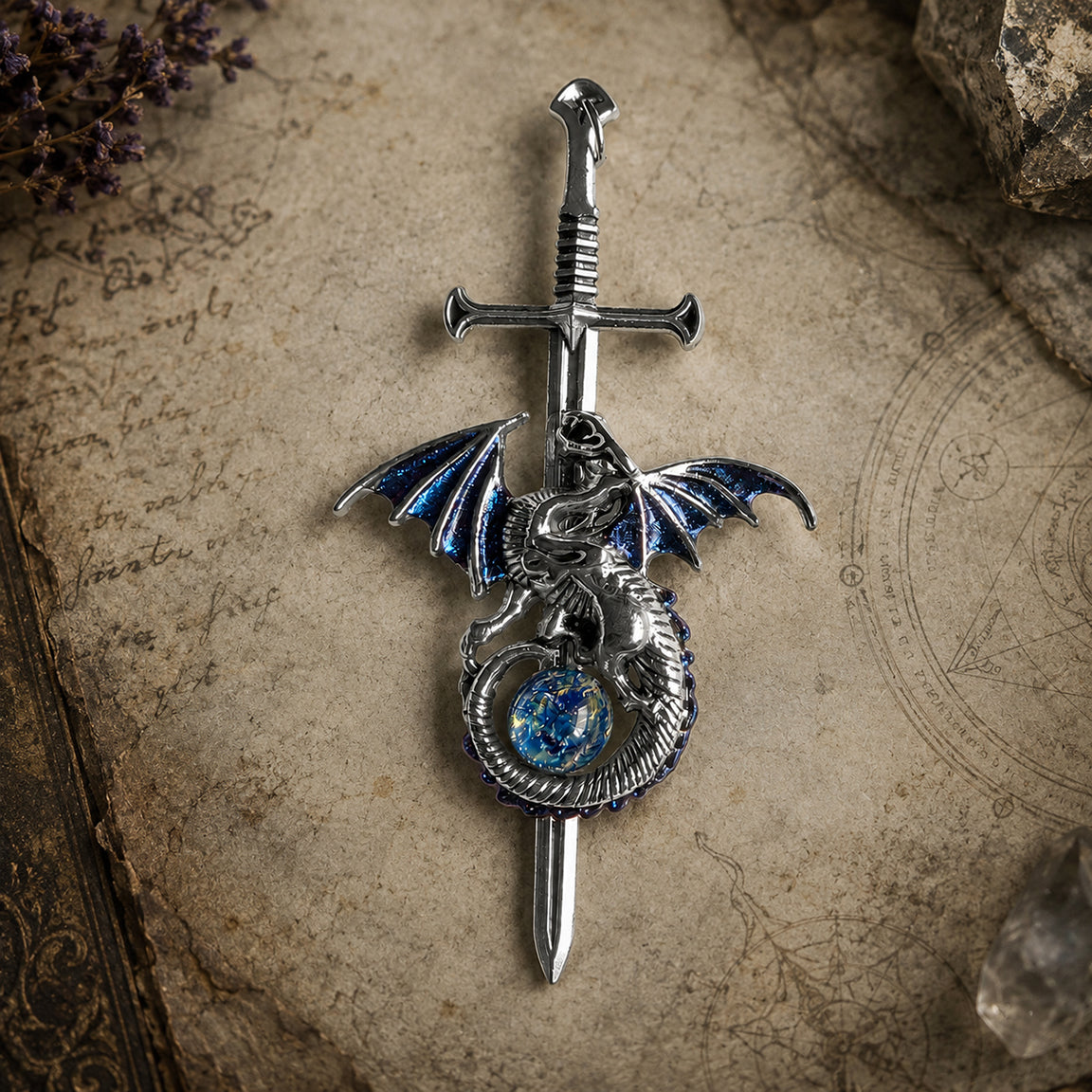 Decorative silver sword with a dragon pendant holding a simulated blue opal on an old map background