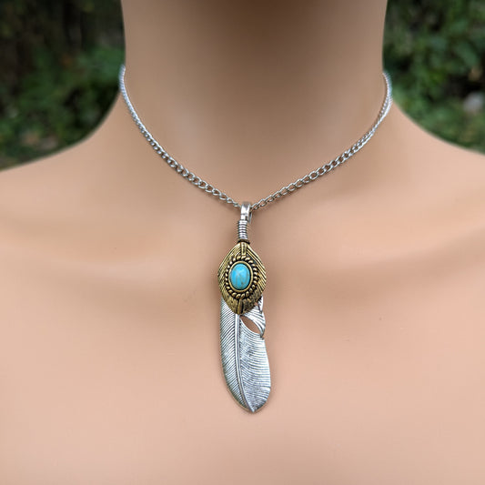 Necklace with a feather pendant on a mannequin