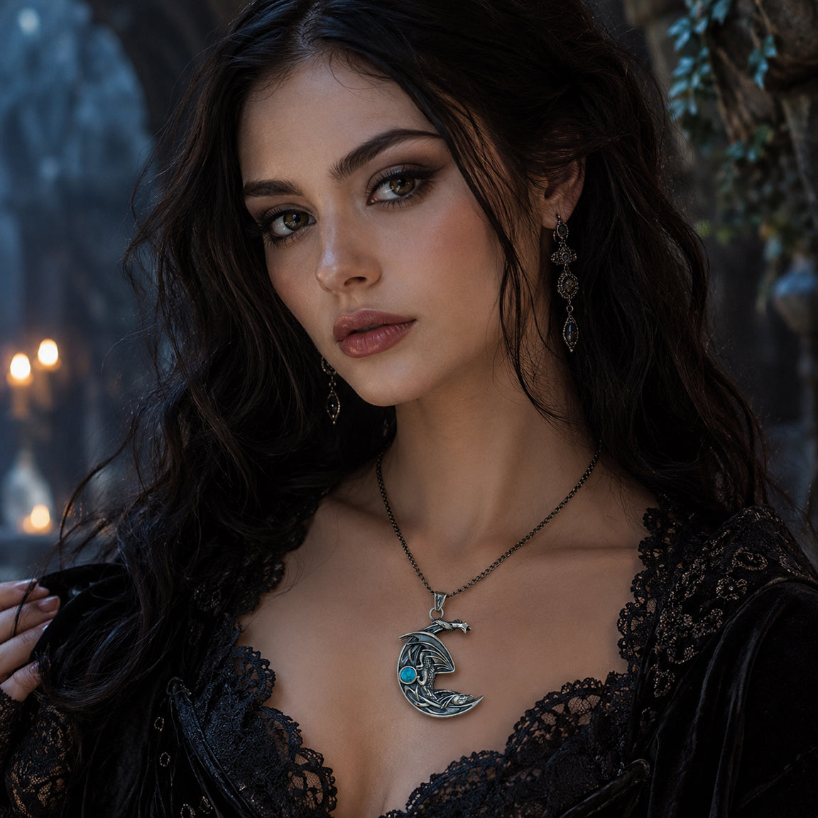 Woman wearing a black lace garment with a necklace featuring a dragon on a moon pendant.  Dragon lover jewelry.