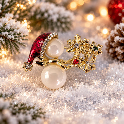Snowman holding snowflakes with rhinestones holiday Christmas brooch