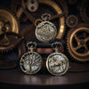 Three ornate pocket watches with intricate designs on a background of gears.