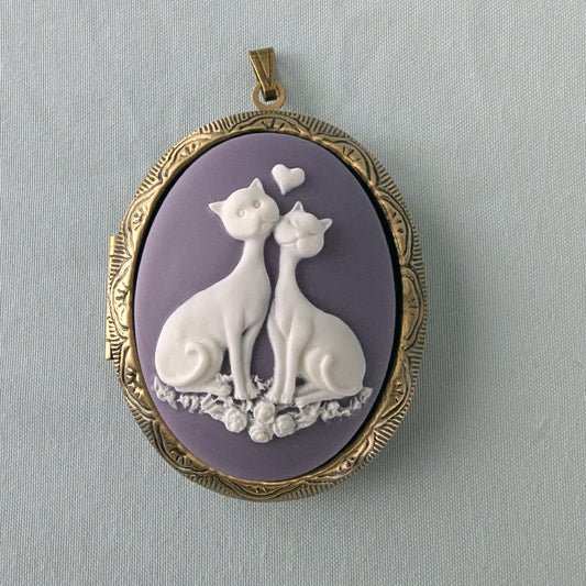 Purple and white cat lovers cameo on bronze (antique gold) locket.
