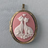 Pink and white cat lovers cameo necklace on bronze locket.