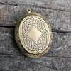 Back side of bronze oval locket