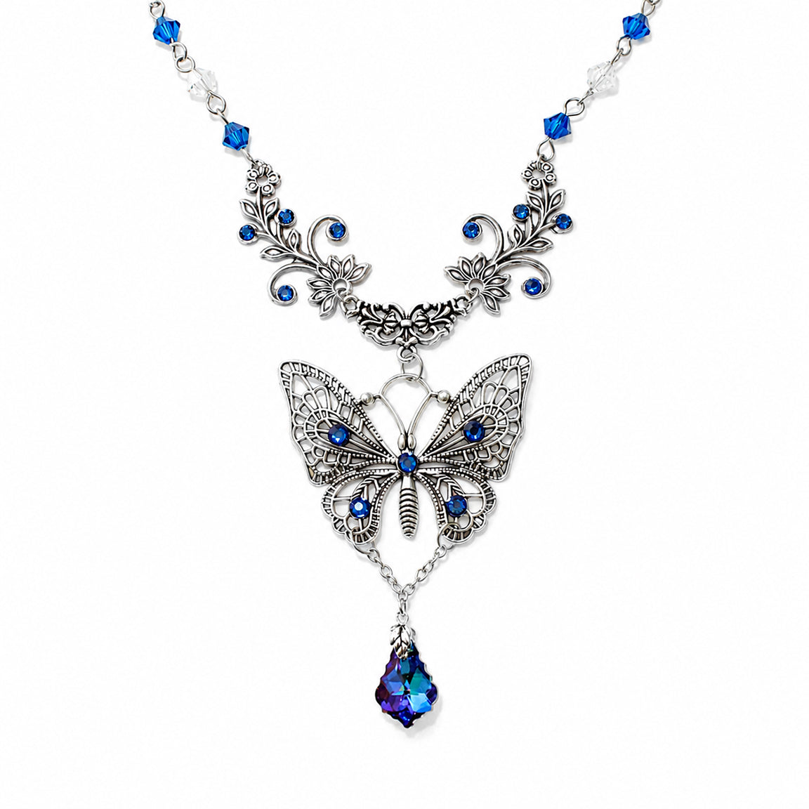 Butterfly necklace with blue gemstones on a white background