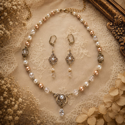 Vintage bridal Swarovski Crystal, Ivory and Gold Pearl necklace and earrings Jewelry set  on a lace background