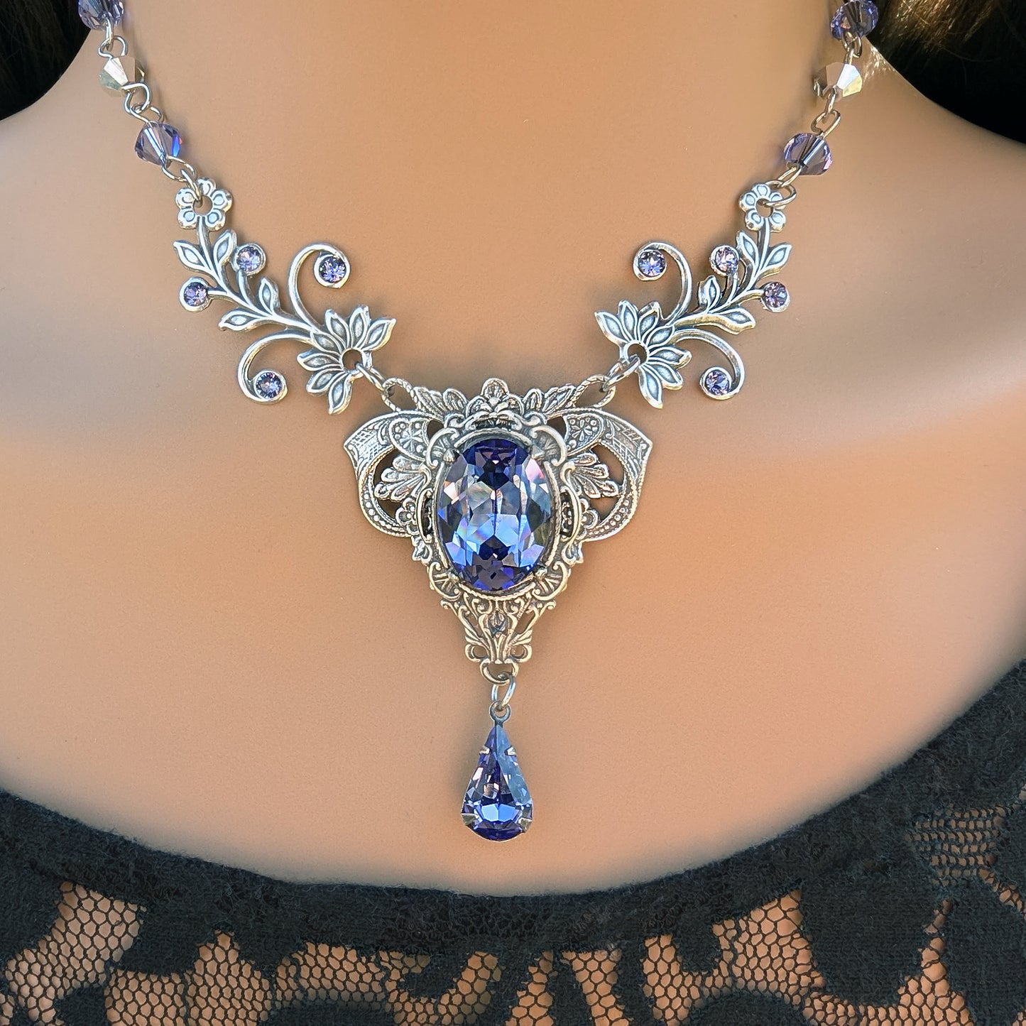 Vintage Silver Tanzanite Crystal Necklace made with Swarovski Crystals on a woman.  Elven floral bridal jewelry.  Fairy tale wedding