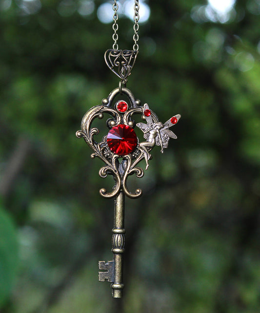 Magical Fairy fantasy key necklace with red Swarovski crystals.  Fantasy jewelry.