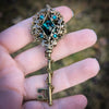 Bronze Elven Fantasy Key Necklace Jewelry made with Emerald Swarovski Crystals.   Mayfair Witches inspired magical jewelry.