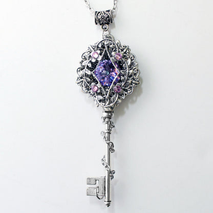 Fantasy floral sterling silver elven key necklace made with Swarovski crystals.  Elven jewelry.