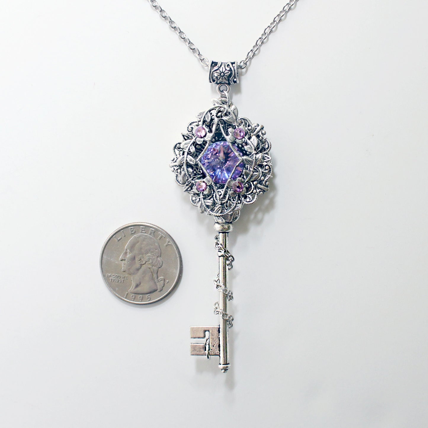 Fantasy floral sterling silver elven key necklace made with Swarovski crystals.  Elven jewelry.