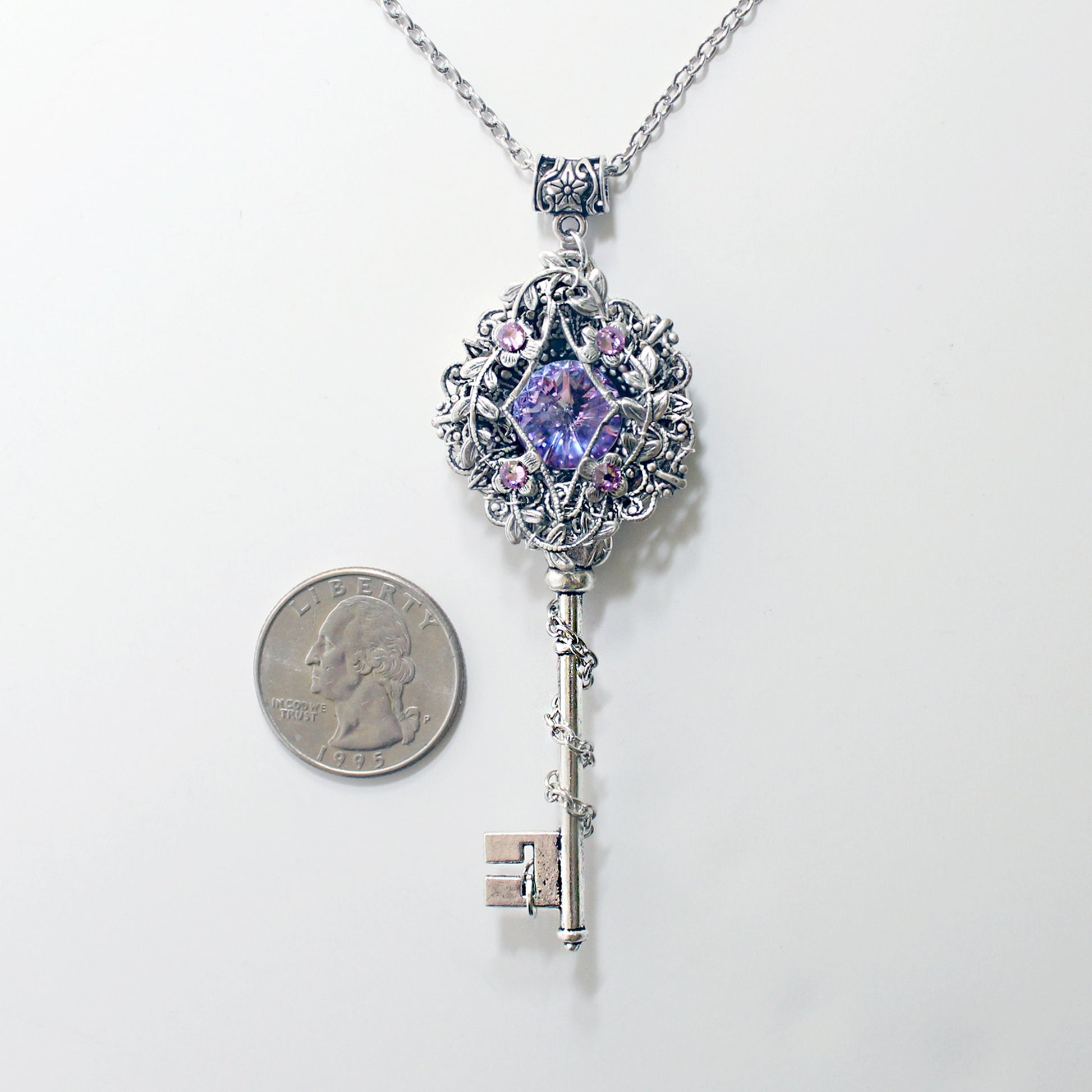 Fantasy floral sterling silver elven key necklace made with Swarovski crystals.  Elven jewelry.
