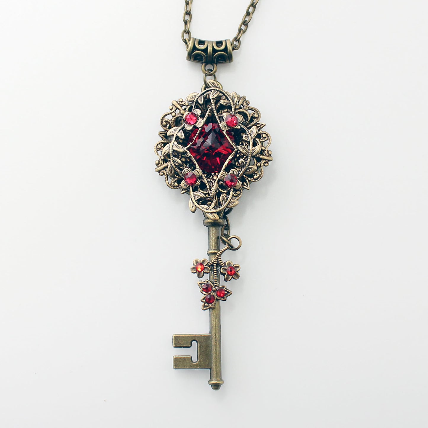 Vintage Elven floral bronze fantasy key necklace made with Scarlet Swarovski crystals.  Fantasy jewelry.  Magical Jewelry.
