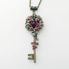 Vintage Elven floral bronze fantasy key necklace made with Scarlet Swarovski crystals.  Fantasy jewelry.  Magical Jewelry.