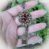 Elven floral bronze fantasy key necklace made with Scarlet Swarovski crystals.  Fantasy jewelry gift.