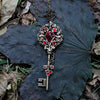 Vintage Elven floral bronze fantasy key necklace made with Scarlet Swarovski crystals.  Fantasy jewelry.  Magical Jewelry. Fairy Fairy, Handmade jewelry
